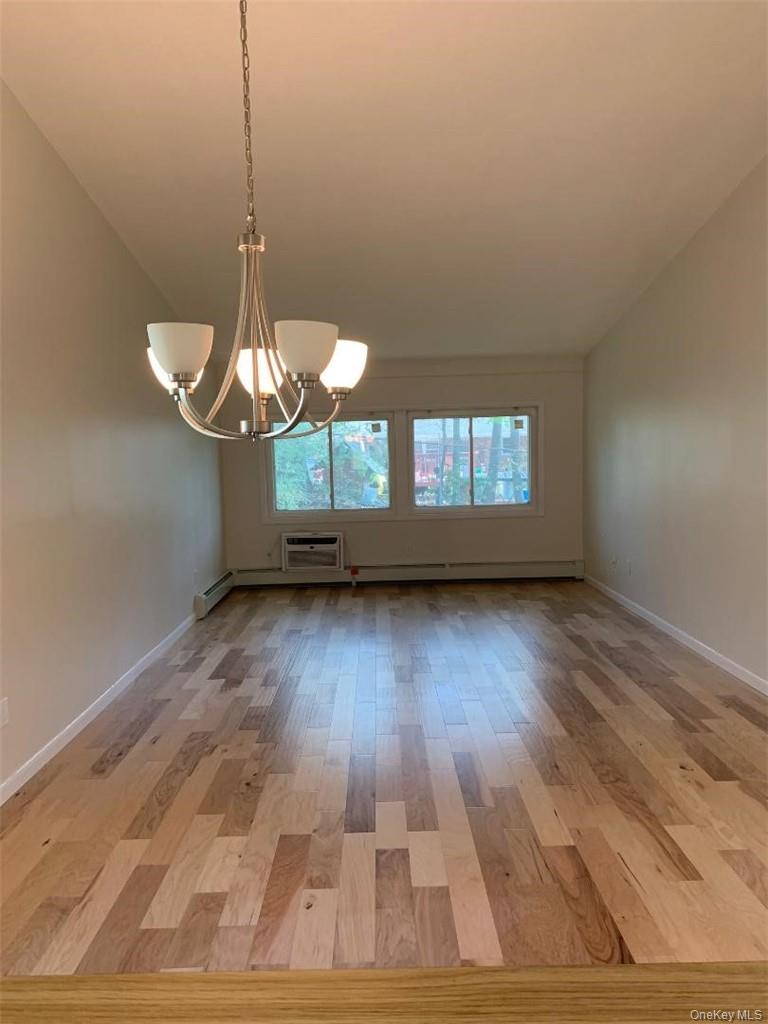 85 North Middletown Road, Unit D2 Nanuet, NY 10954 - Photo 4 of 14 Huge open living room opens to dining area