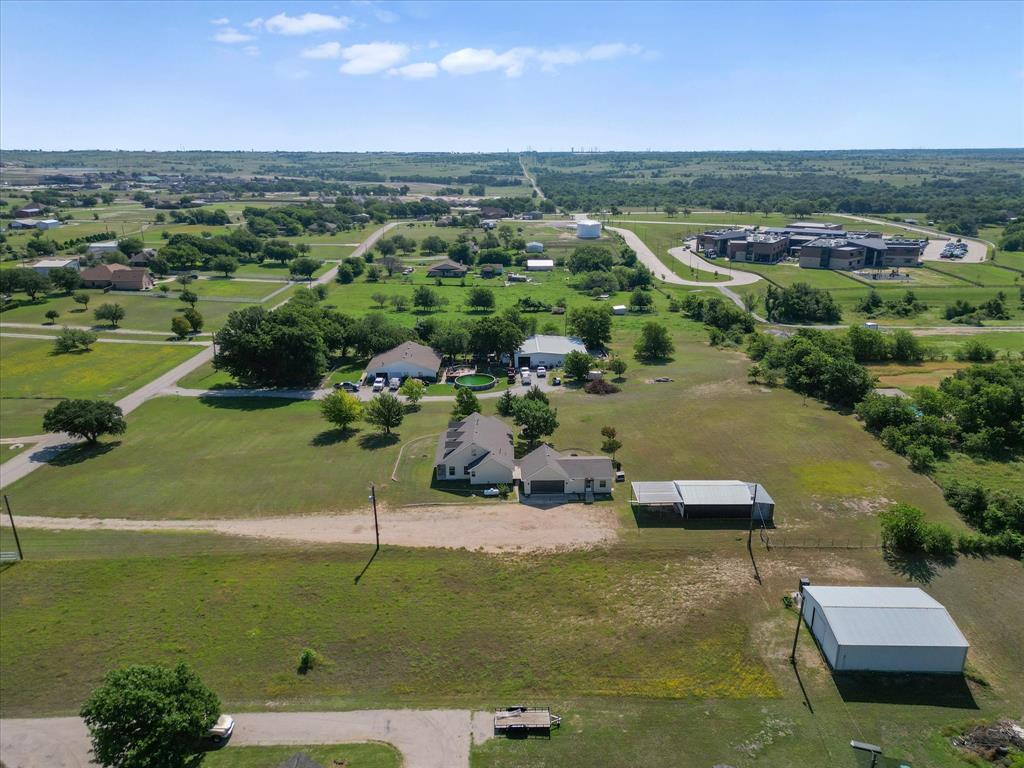 289 County Road 4655 Rhome, TX 76078 - Photo 32 of 34 Expansive property featuring multiple structures and open land