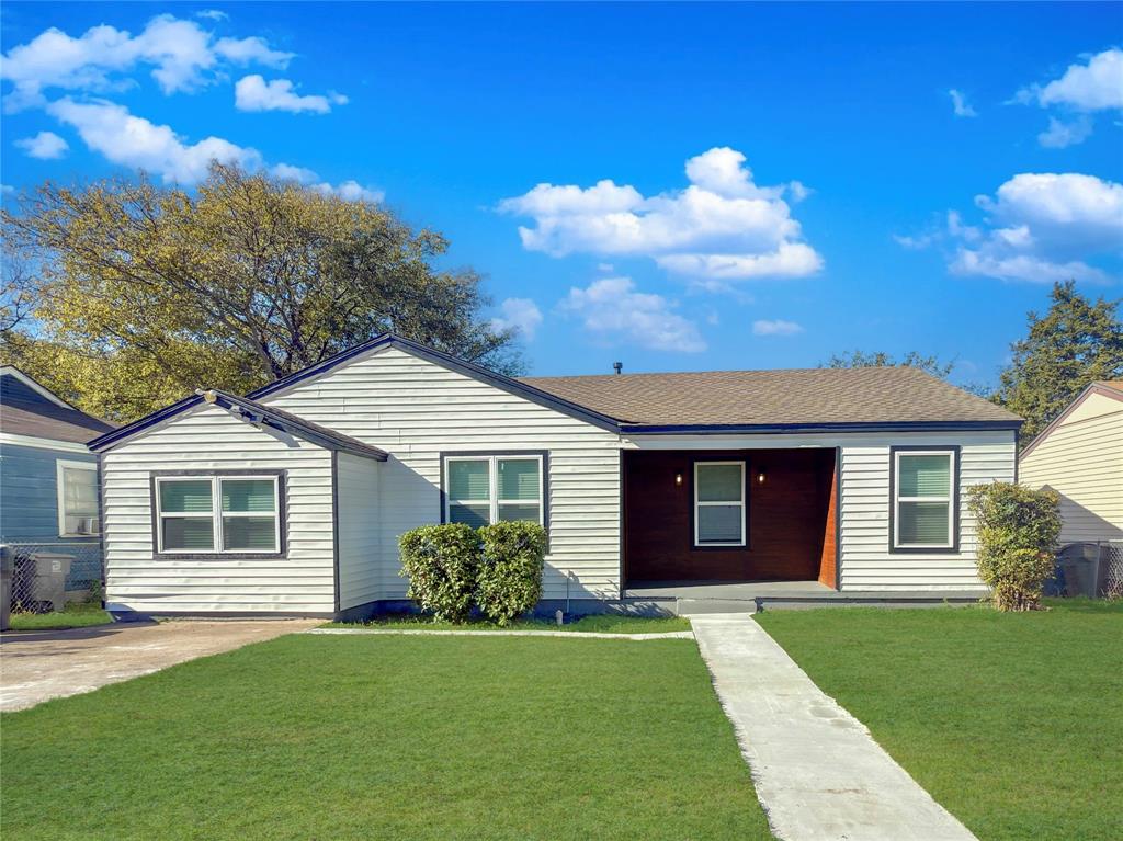 2431 Marfa Avenue Dallas, TX 75216 - Photo 2 of 39 a view of a house with a yard