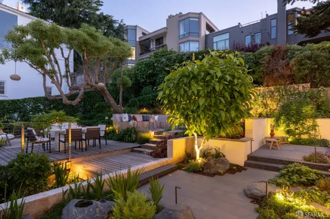a view of a patio with swimming pool