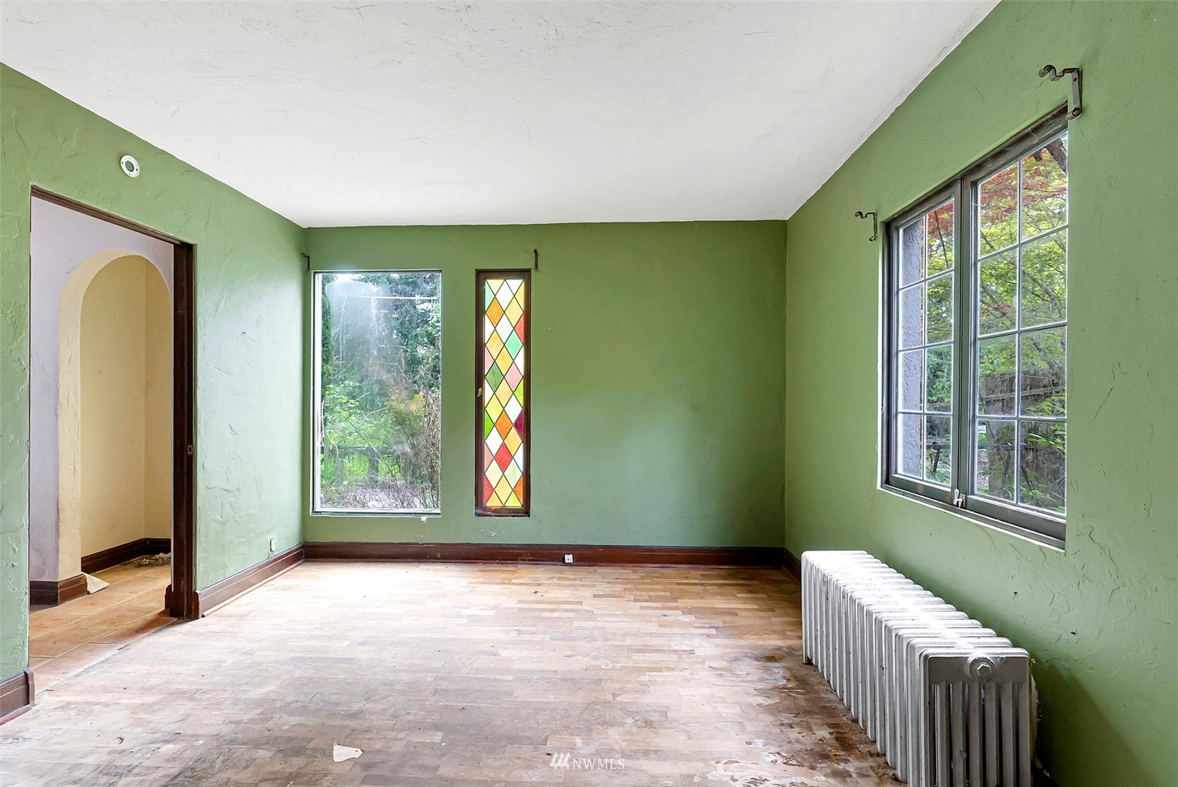 16601 Delano Road Southwest Lakebay, WA 98349 - Photo 17 of 31 a view of an empty room with a window and bathroom