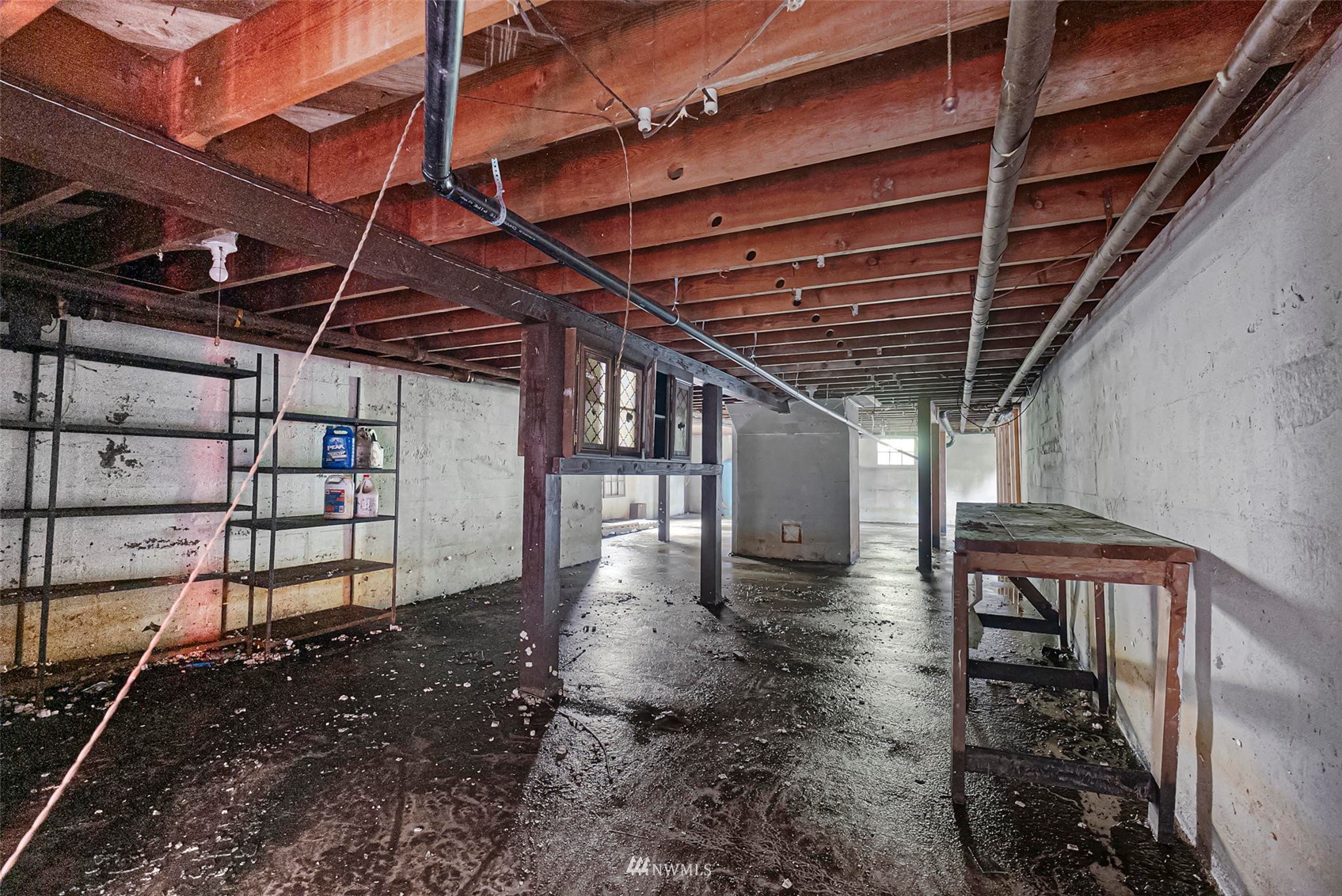 16601 Delano Road Southwest Lakebay, WA 98349 - Photo 27 of 31 a view of an empty room with wooden walls