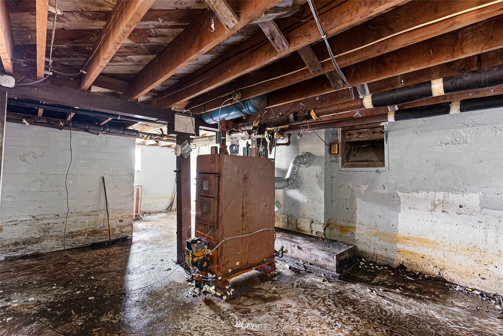 16601 Delano Road Southwest Lakebay, WA 98349 - Photo 28 of 31 a storage room with water heater