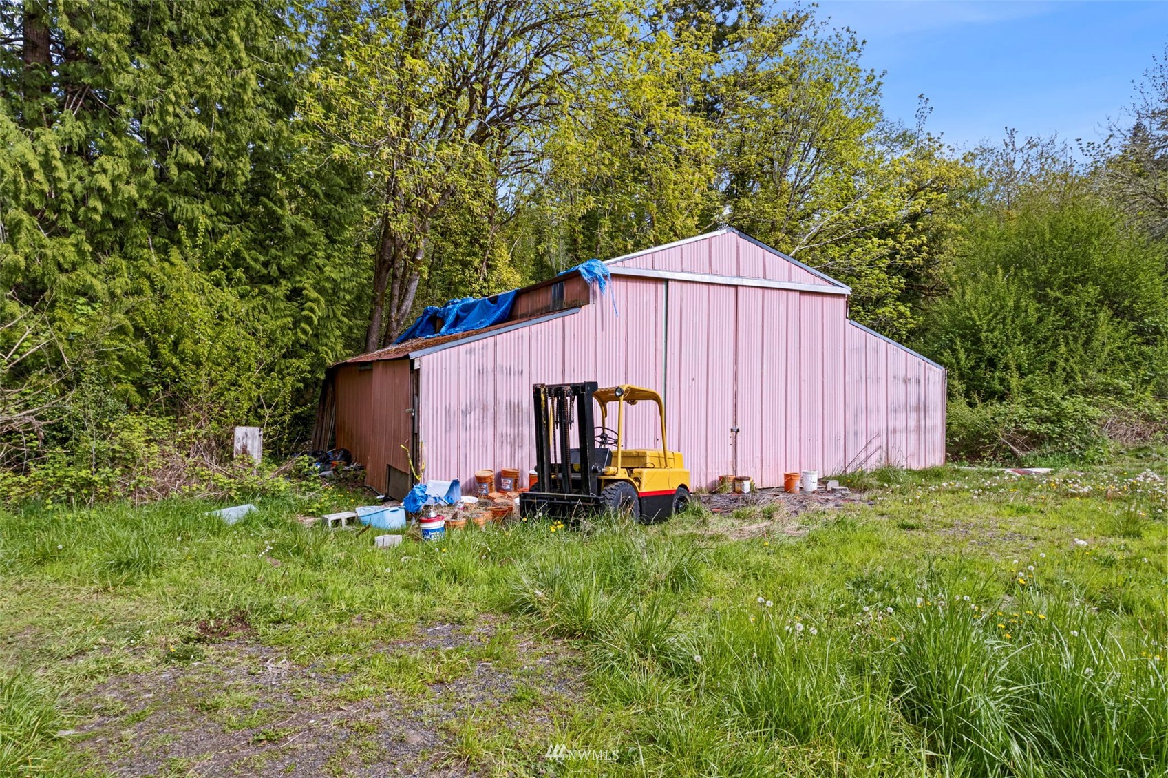16601 Delano Road Southwest Lakebay, WA 98349 - Photo 29 of 31 a backyard of a house with lots of green space