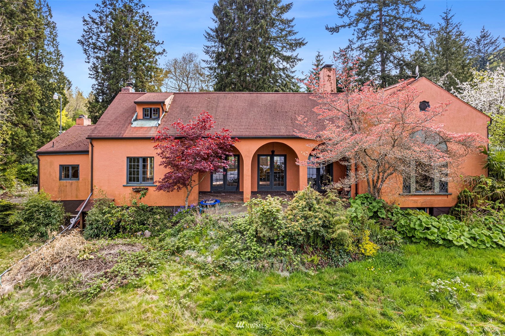16601 Delano Road Southwest Lakebay, WA 98349 - Photo 4 of 31 front view of a house with a yard