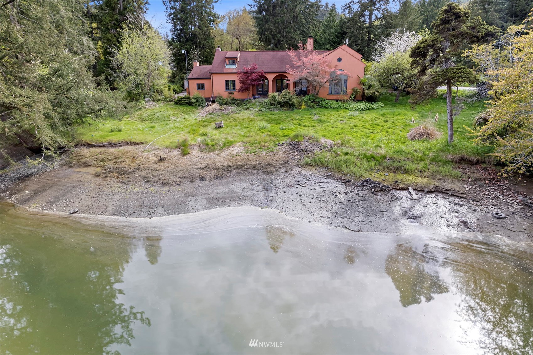 16601 Delano Road Southwest Lakebay, WA 98349 - Photo 5 of 31 a view of a house with a yard