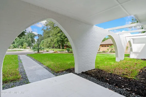 a house view with a garden space