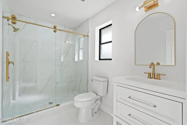 a front view of house with garage and yard