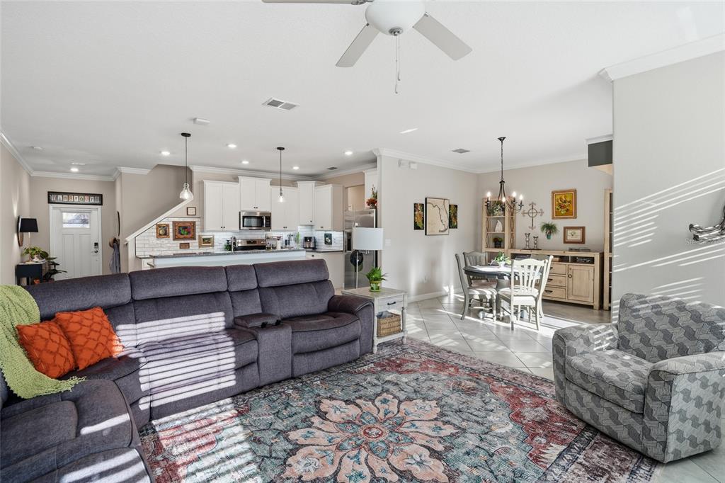 1370 White Fox Run Lutz, FL 33549 - Photo 16 of 49 a living room with furniture and kitchen view