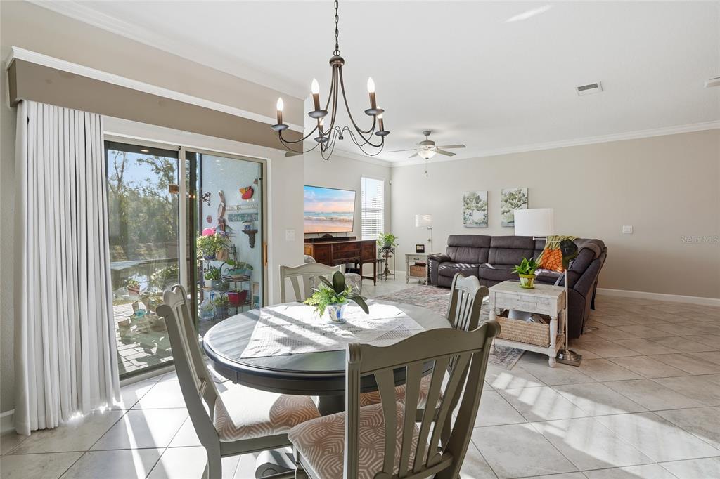 1370 White Fox Run Lutz, FL 33549 - Photo 18 of 49 a view of a dining room with furniture window and outside view
