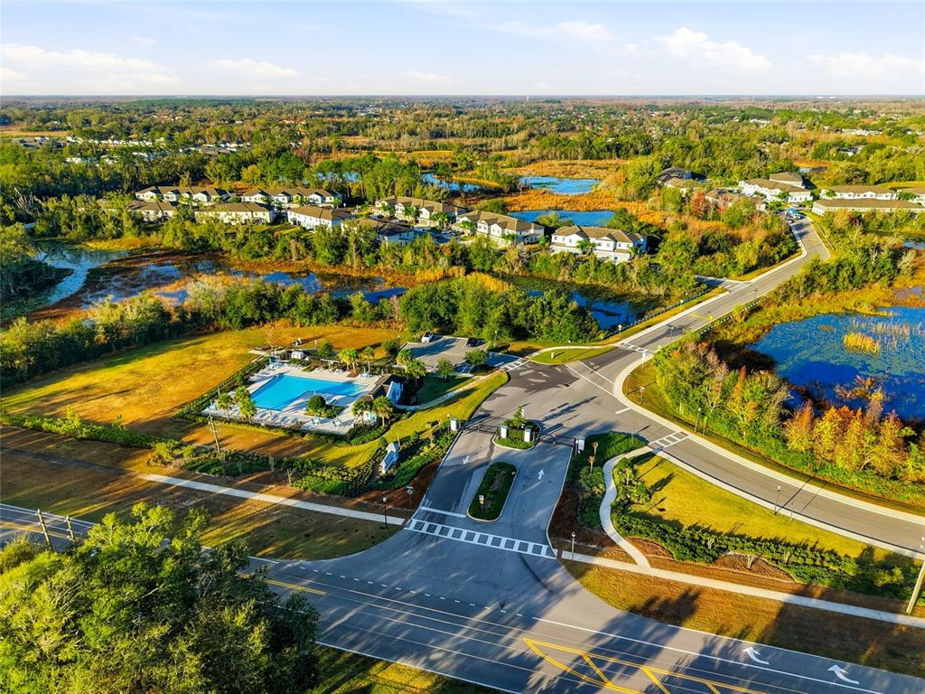 1370 White Fox Run Lutz, FL 33549 - Photo 44 of 49 an aerial view of residential houses with outdoor space