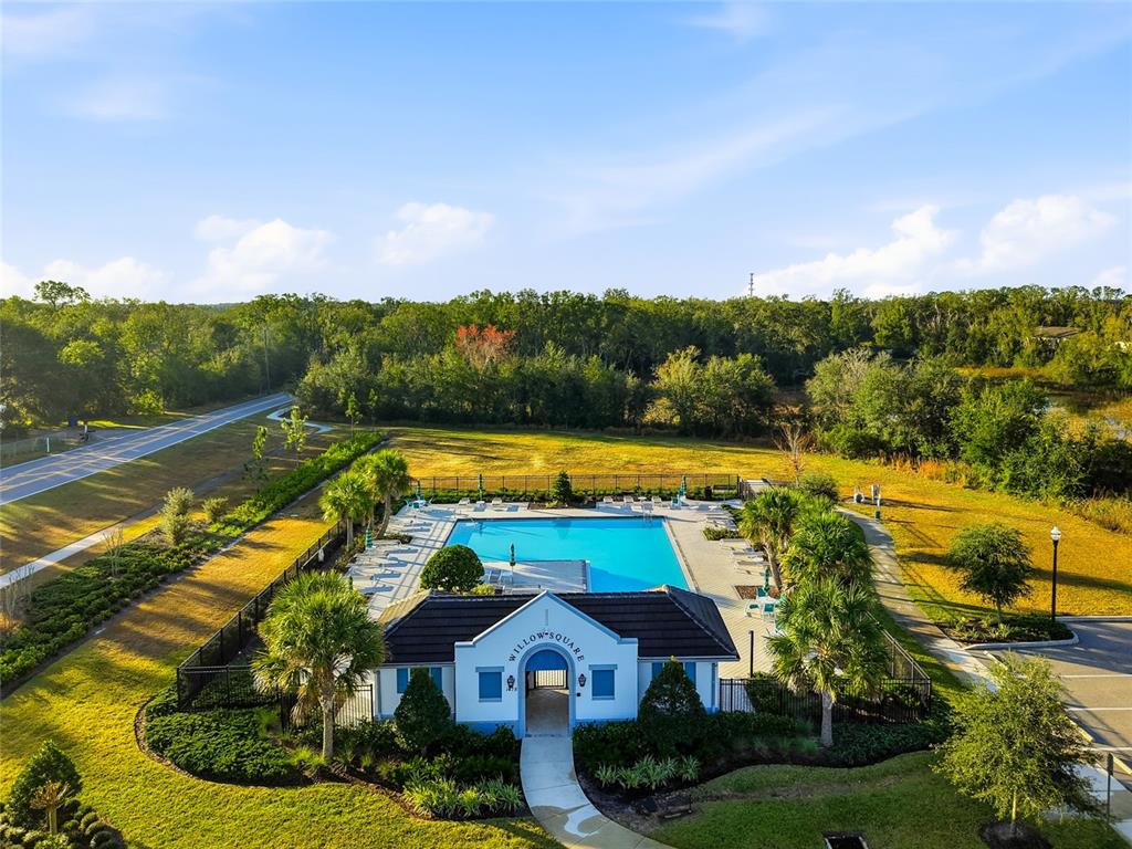 1370 White Fox Run Lutz, FL 33549 - Photo 46 of 49 an aerial view of a house with a swimming pool yard and outdoor seating
