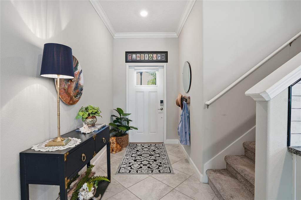 1370 White Fox Run Lutz, FL 33549 - Photo 7 of 49 a hallway with wooden floor