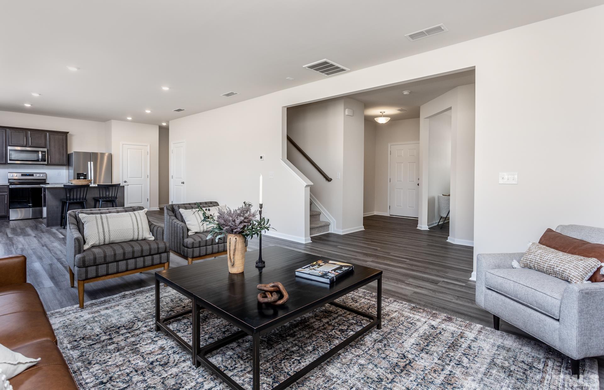 3505 Dragonfly River Court Raleigh, NC 27604 - Photo 8 of 28 a living room with furniture and wooden floor