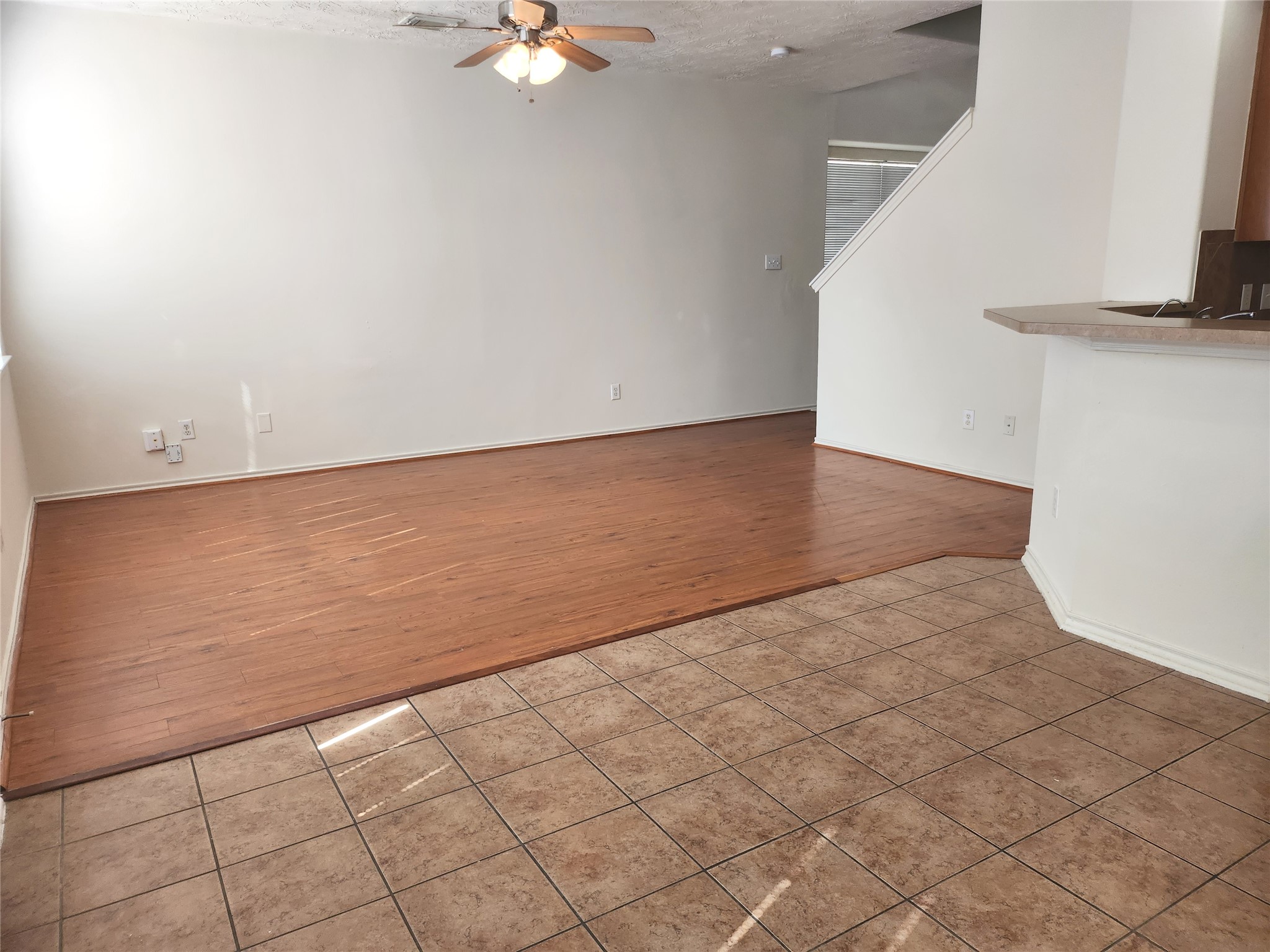 11509 Hackmatack Way Houston, TX 77066 - Photo 8 of 16 a view of an empty room with windows