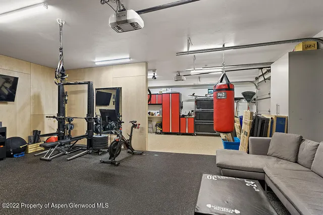 a view of gym equipment and windows
