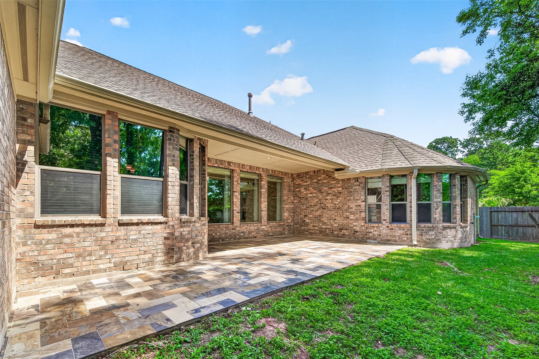 2310 Spring Lake Park Lane Spring, TX 77386 - Photo 44 of 47 a front view of a house with a garden and yard