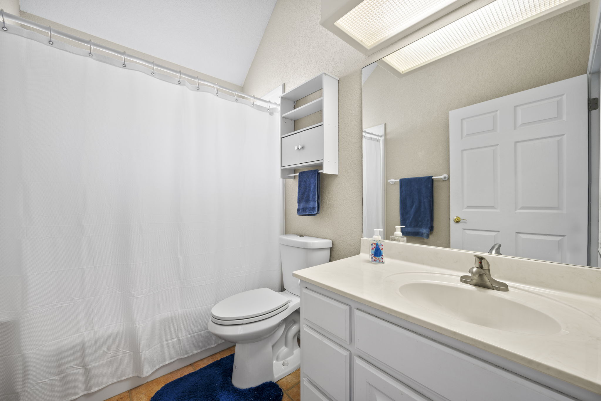 107 Stacey Cove Georgetown, TX 78628 - Photo 18 of 29 a bathroom with a sink toilet and shower