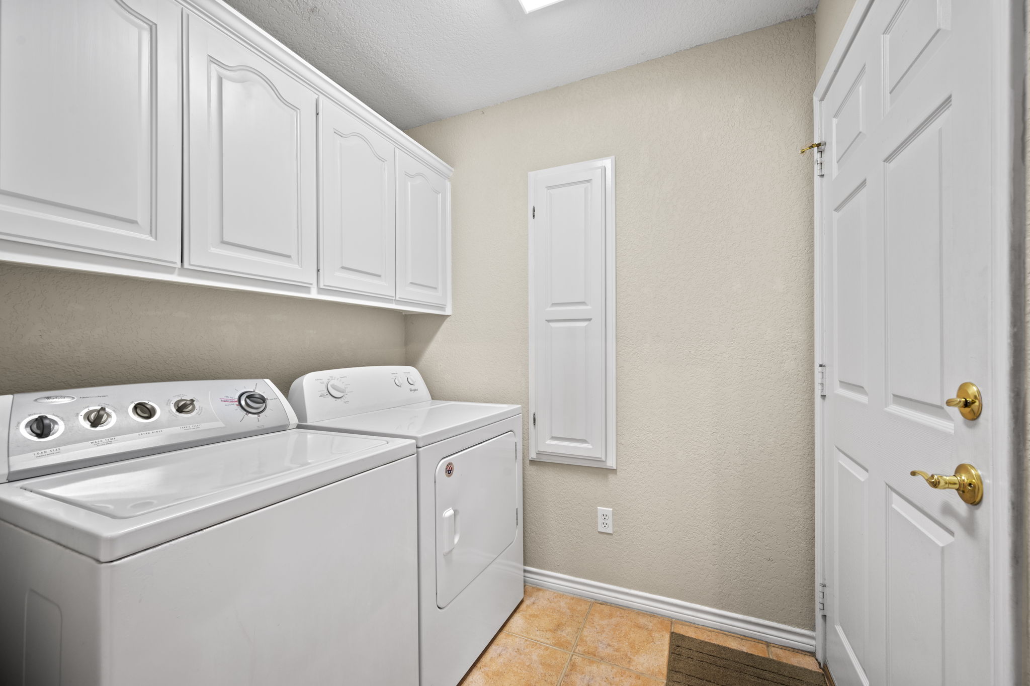 107 Stacey Cove Georgetown, TX 78628 - Photo 20 of 29 a view of storage and utility room with washer and dryer
