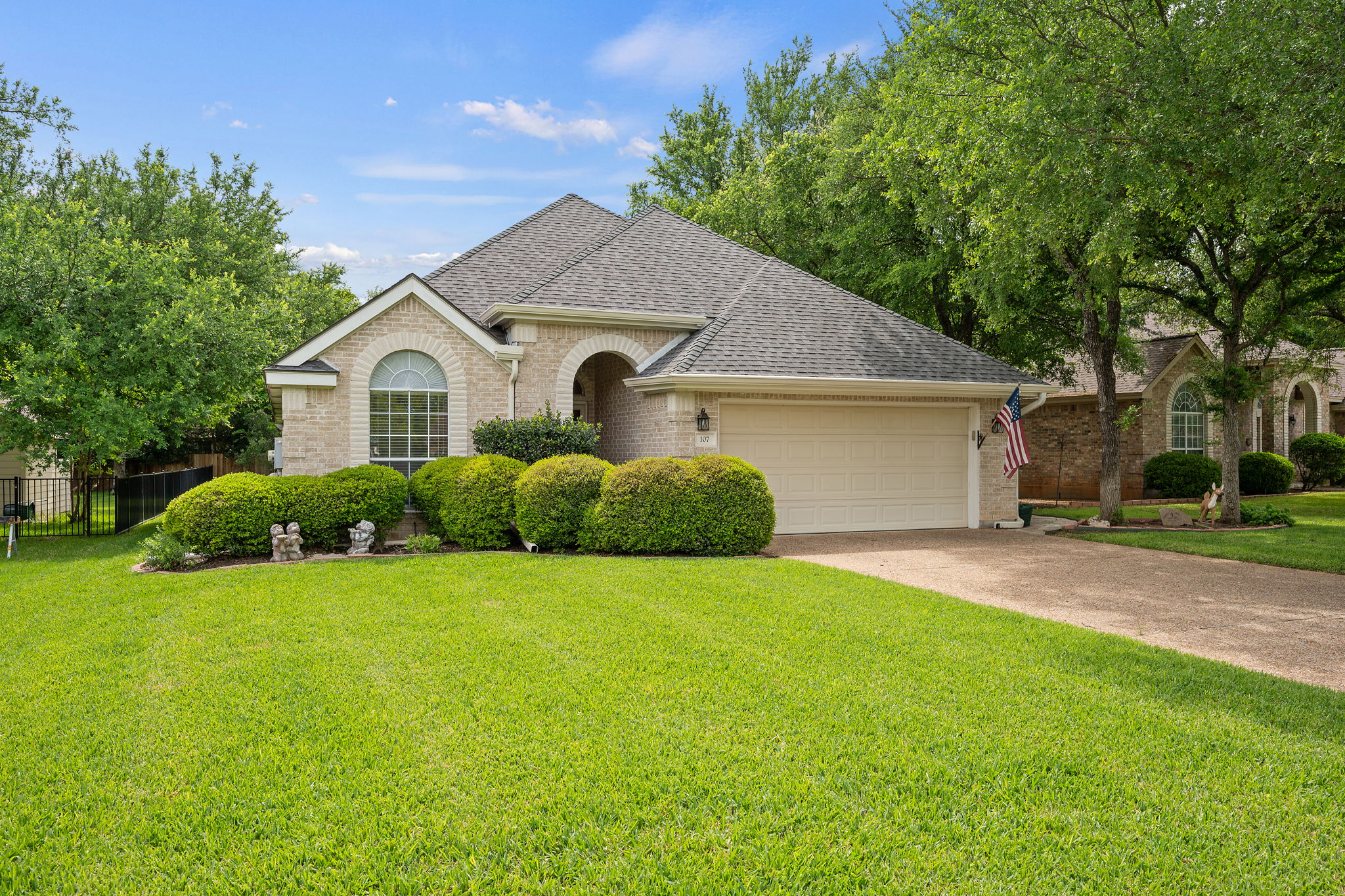107 Stacey Cove Georgetown, TX 78628 - Photo 2 of 29 a front view of house with yard and green space
