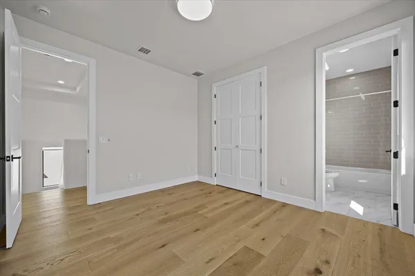 a kitchen with a stove and cabinets