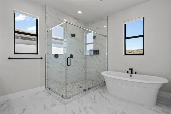 a kitchen with a refrigerator and a sink