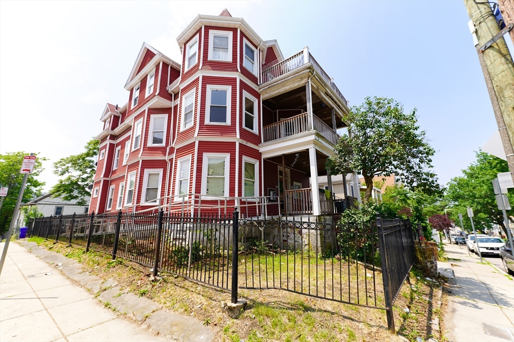 a front view of a multi story residential apartment building