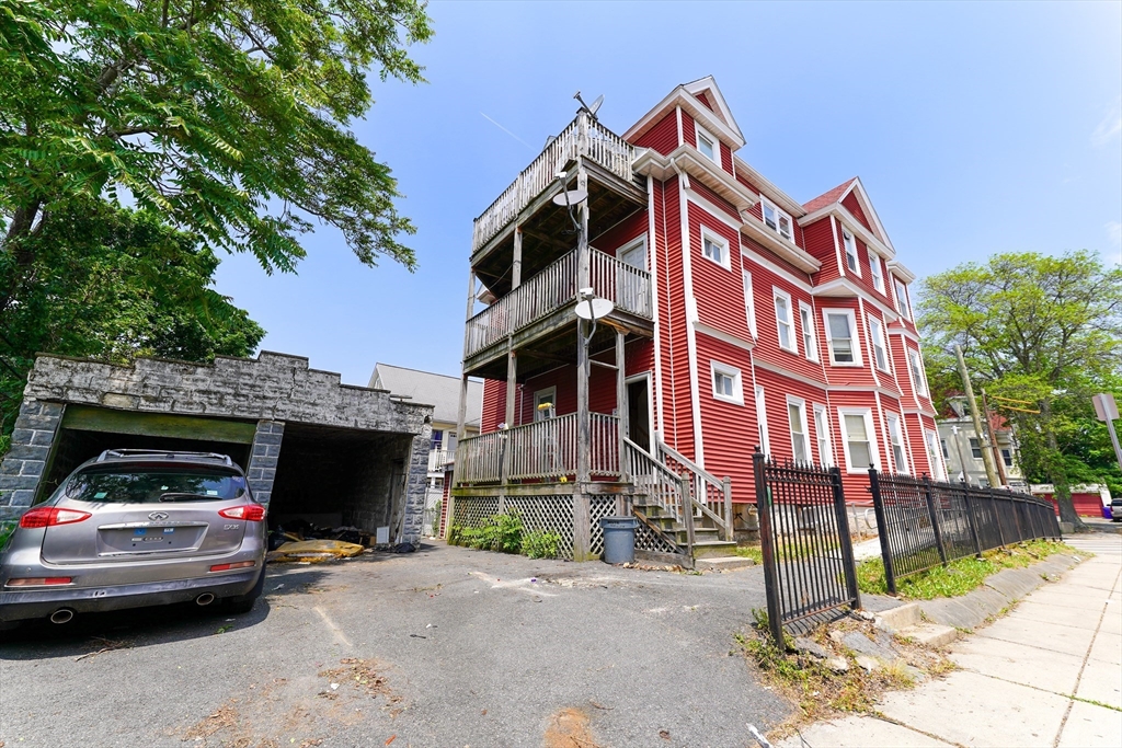 107 Devon Street Boston, MA 02121 - Photo 2 of 9 a view of street along with parked cars