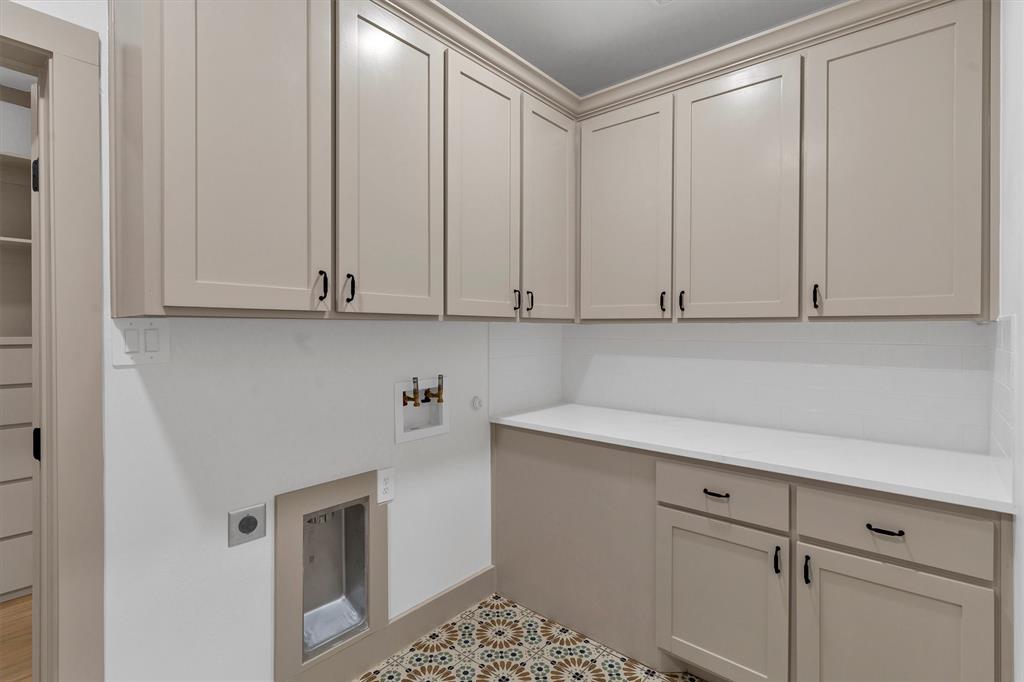 5006 Stover Way Granbury, TX 76049 - Photo 21 of 40 a view of cabinets with wooden floor