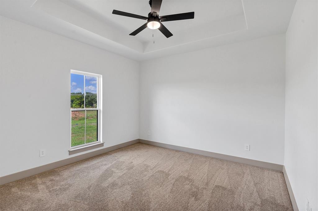 5006 Stover Way Granbury, TX 76049 - Photo 30 of 40 an empty room with a window