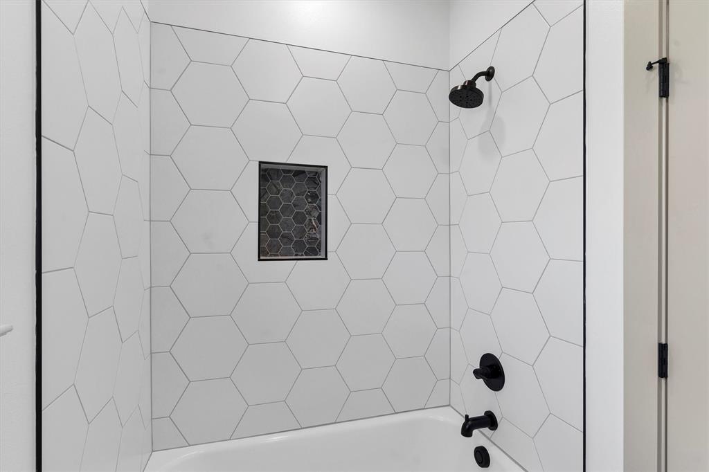 5006 Stover Way Granbury, TX 76049 - Photo 32 of 40 a bathroom with a shower