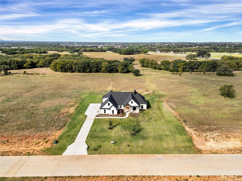 5006 Stover Way Granbury, TX 76049 - Photo 39 of 40 a view of a lake with a nearby beach