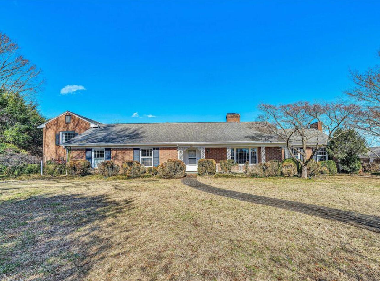 3207 Orchard Hill Road Southwest Roanoke, VA 24018 - Photo 1 of 1 a front view of a house with a yard