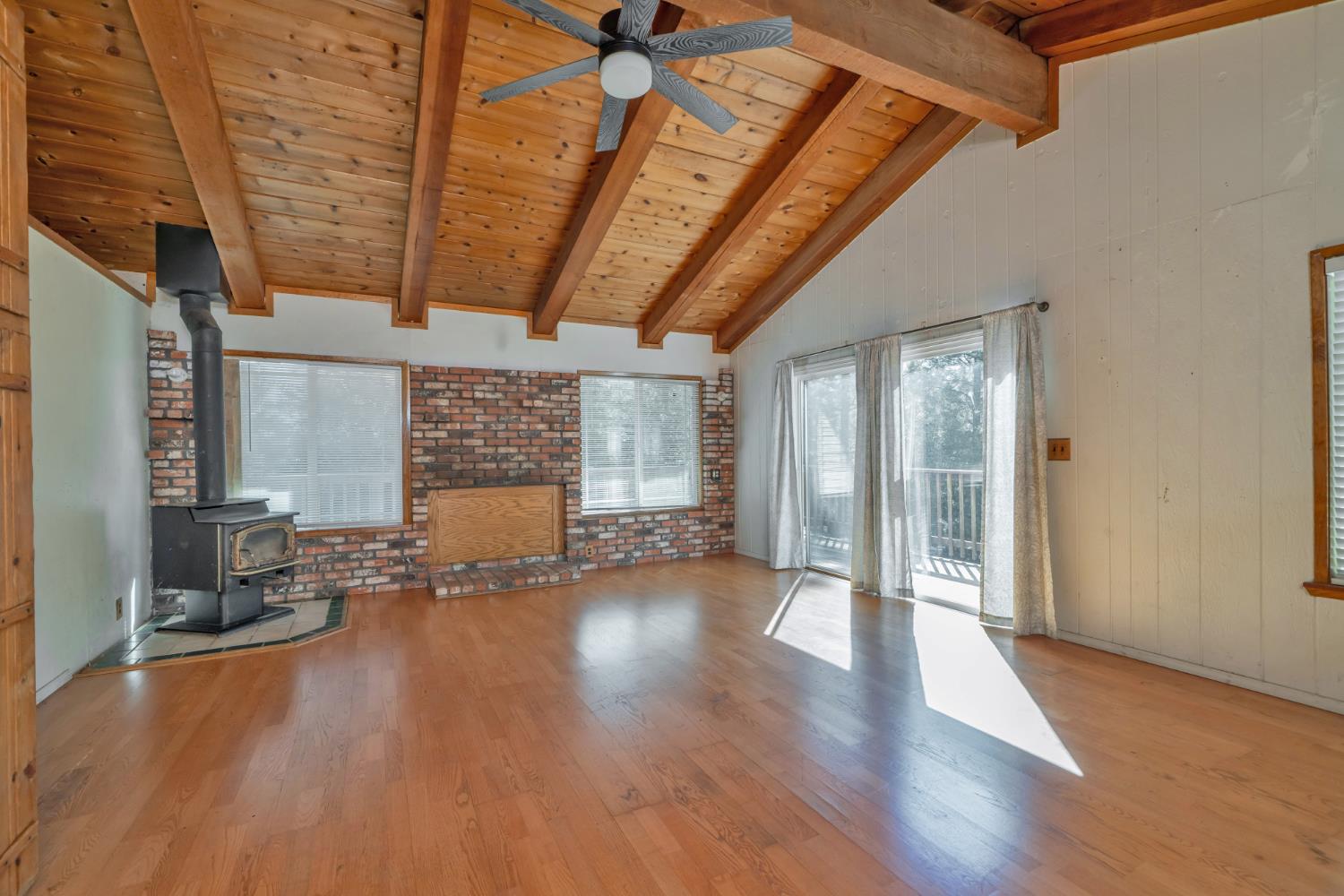 6426 Sly Park Road Placerville, CA 95667 - Photo 13 of 32 a view of empty room with wooden floor