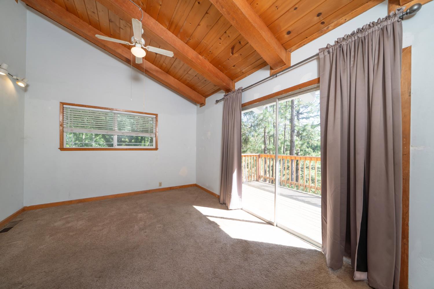 6426 Sly Park Road Placerville, CA 95667 - Photo 17 of 32 a view of an empty room with a window
