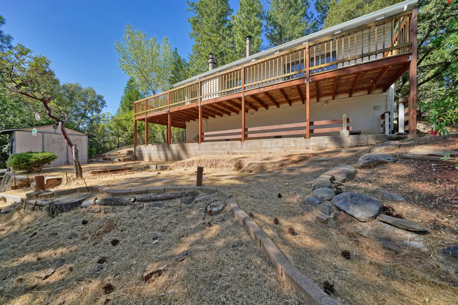 6426 Sly Park Road Placerville, CA 95667 - Photo 26 of 32 a view of a house with a yard
