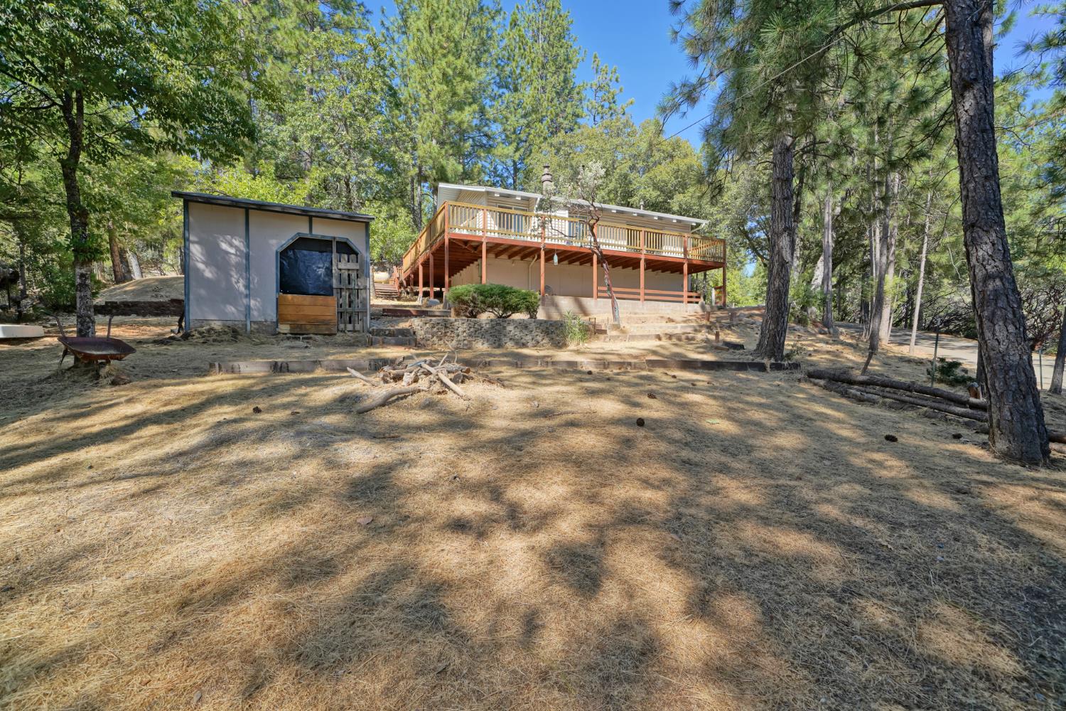 6426 Sly Park Road Placerville, CA 95667 - Photo 27 of 32 a view of a house with backyard and sitting area
