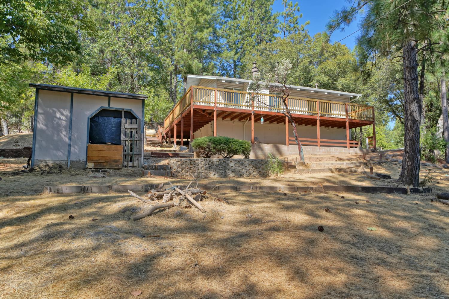6426 Sly Park Road Placerville, CA 95667 - Photo 28 of 32 a front view of a house with garden