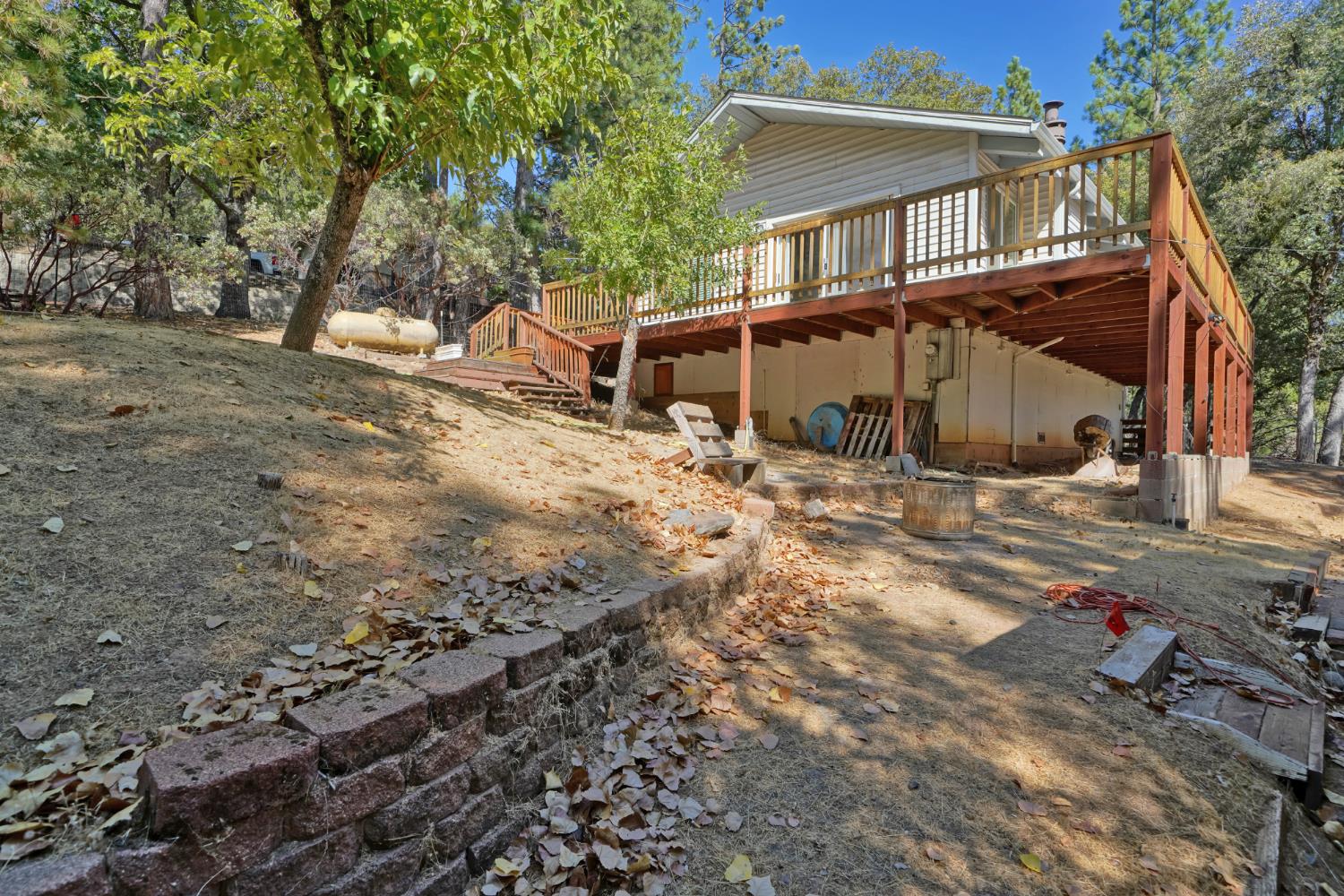 6426 Sly Park Road Placerville, CA 95667 - Photo 29 of 32 a view of a house with a yard