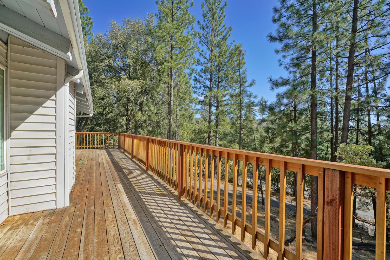 6426 Sly Park Road Placerville, CA 95667 - Photo 4 of 32 a view of balcony with wooden floor and fence