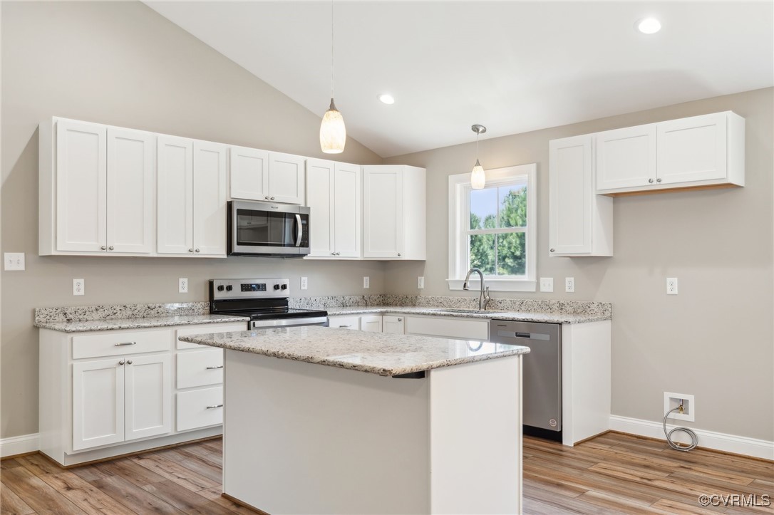 520 Salem Church Road Cumberland, VA 23040 - Photo 14 of 36 a kitchen with granite countertop white cabinets and white appliances