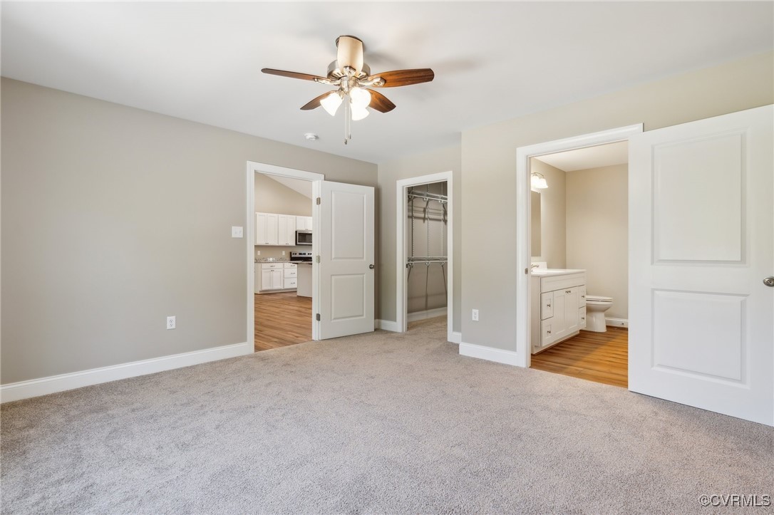520 Salem Church Road Cumberland, VA 23040 - Photo 18 of 36 an empty room with closet and a chandelier fan