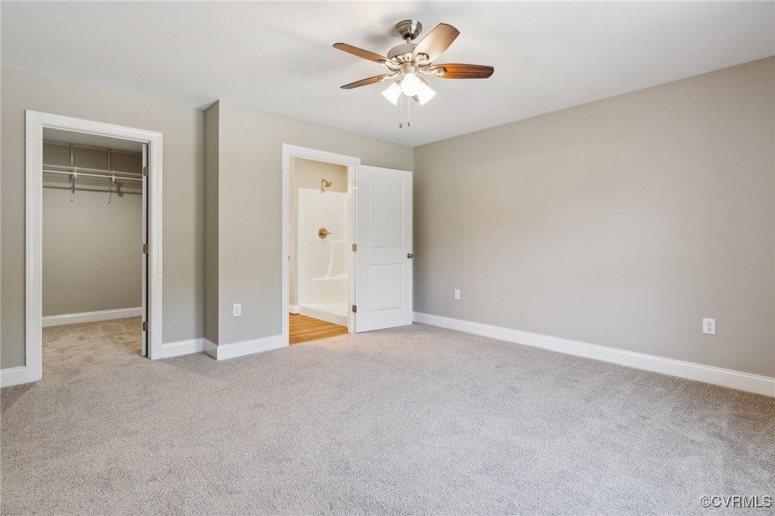 520 Salem Church Road Cumberland, VA 23040 - Photo 19 of 36 an empty room with closet and a ceiling fan