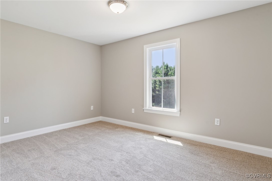 520 Salem Church Road Cumberland, VA 23040 - Photo 21 of 36 an empty room with a window