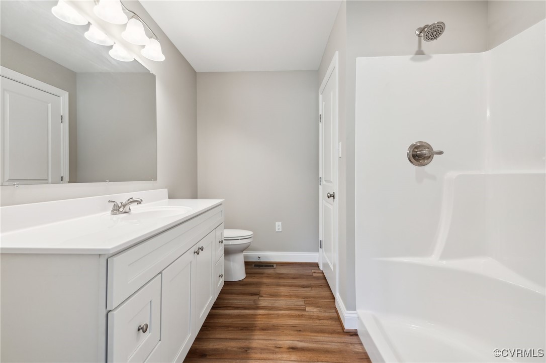 520 Salem Church Road Cumberland, VA 23040 - Photo 22 of 36 a bathroom with a sink a mirror and a bathtub