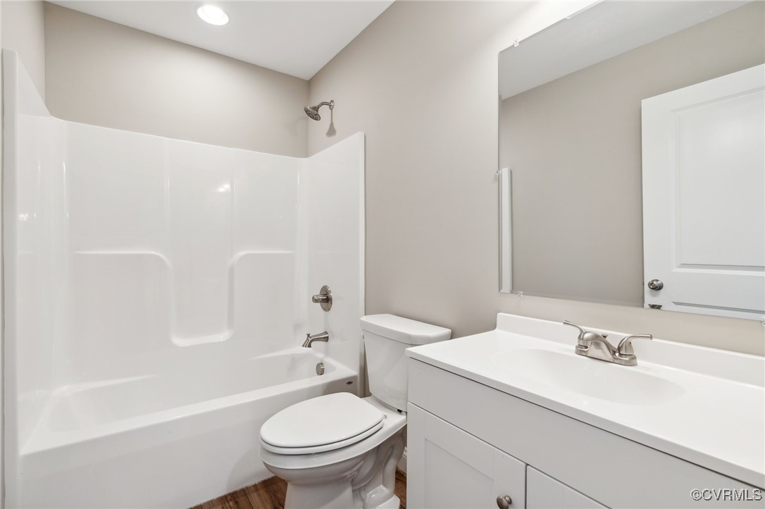 520 Salem Church Road Cumberland, VA 23040 - Photo 28 of 36 a bathroom with a sink toilet vanity and shower
