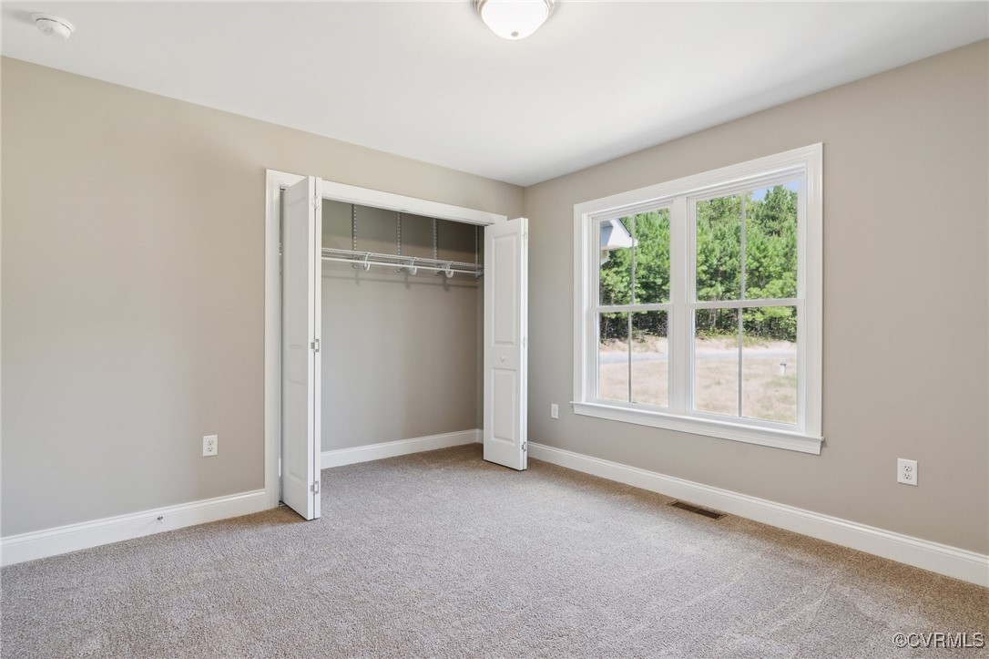 520 Salem Church Road Cumberland, VA 23040 - Photo 30 of 36 an empty room with windows and closet