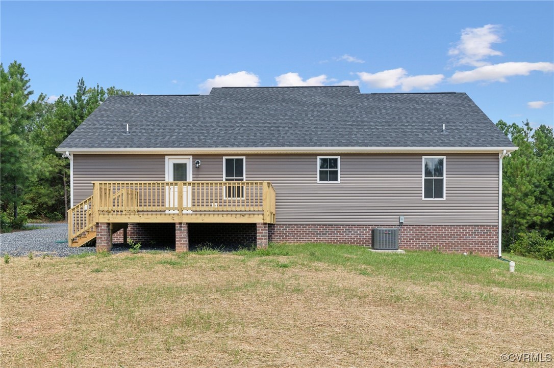 520 Salem Church Road Cumberland, VA 23040 - Photo 35 of 36 a front view of a house with a yard and garage