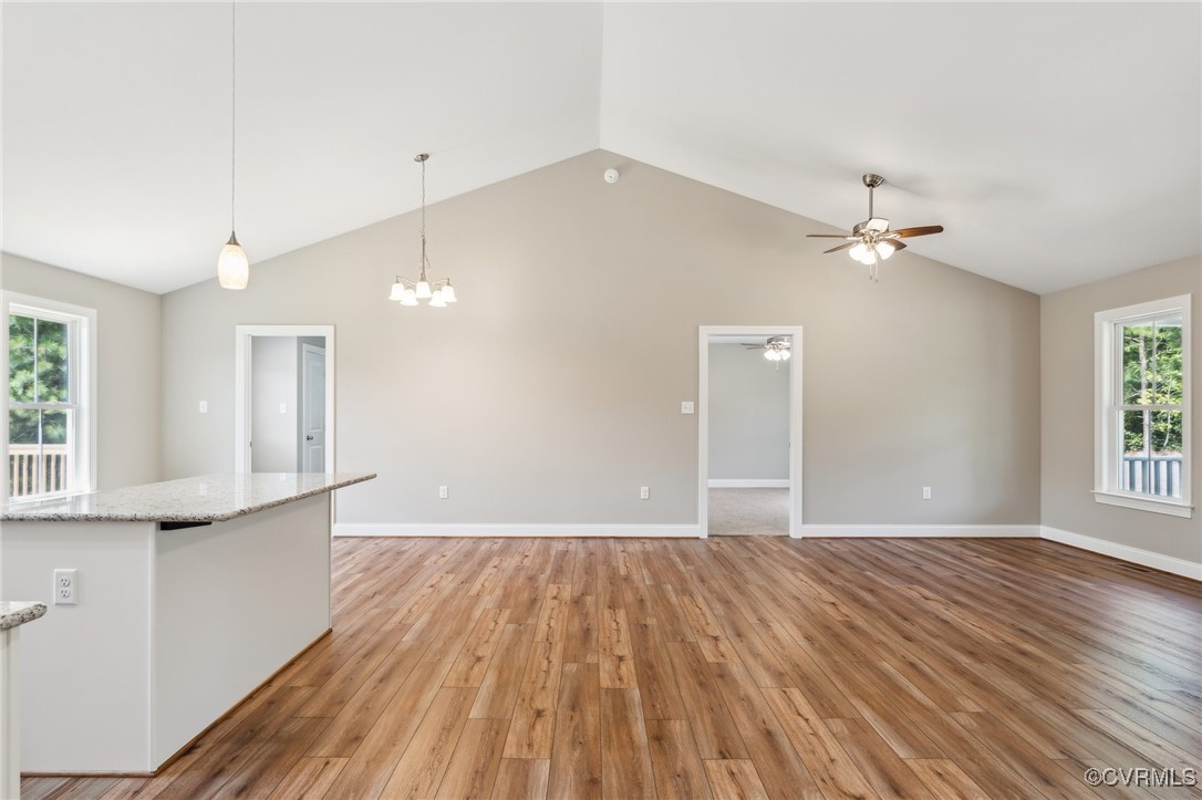 520 Salem Church Road Cumberland, VA 23040 - Photo 7 of 36 a view of an empty room with a window and wooden floor