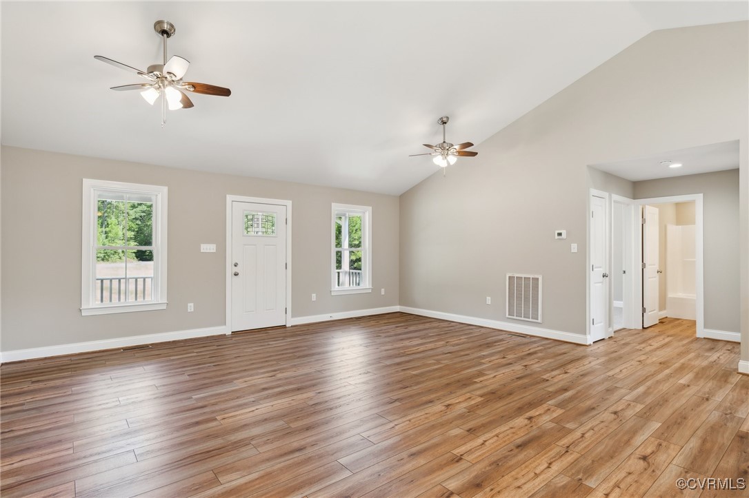 520 Salem Church Road Cumberland, VA 23040 - Photo 8 of 36 a view of an empty room with a window and wooden floor